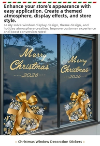 Close-up of golden Christmas window stickers with 2026 lettering and snowflakes
