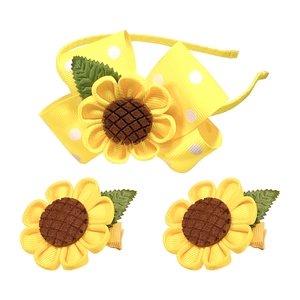 Kids sunflower hair accessories set including a polka dot headband and fabric flower clips