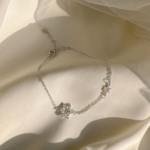 Minimalist silver star bracelet with sparkling zircon pavé and hollow star charm