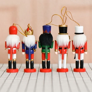 Set of five 13cm wooden Nutcracker soldier ornaments with gold hanging ropes and round bases