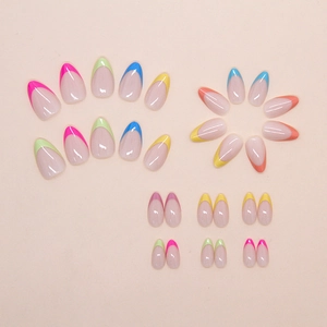 French macaron almond press-on nails set with colorful tips in a flower arrangement