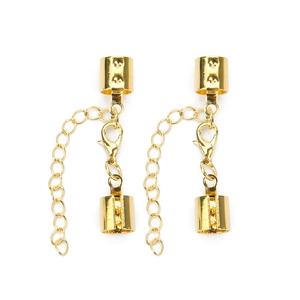 Detail of golden lobster clasps with extension chains for DIY jewelry making