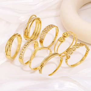 Elegant 18k gold plated stainless steel bangles with hollow geometric and diamond designs