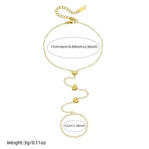 Gold-plated stainless steel hand chain with heart charms and sparkling zircon accents