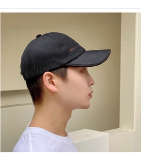 Side view of black mesh baseball cap featuring breathable polyester fabric for summer sun protection