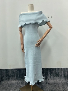 Detailed knit texture and ruffle hem of this off-shoulder light blue maxi dress