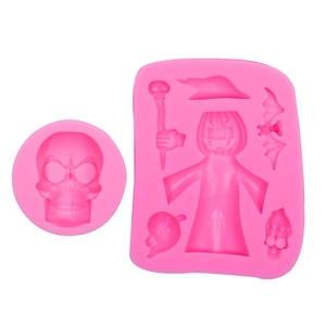 Pink silicone Halloween molds featuring skull, pumpkin, ghost, and bat shapes for cake decor