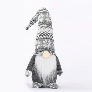 Nordic Christmas gnome plush with gray snowflake knitted hat and long white beard on white background