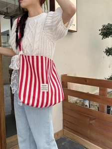Red and white striped canvas tote bag with lace straps and large capacity for daily use