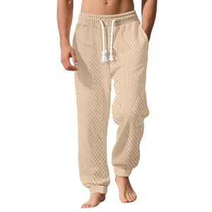 Men's beige waffle knit joggers with textured jacquard pattern and drawstring waistband