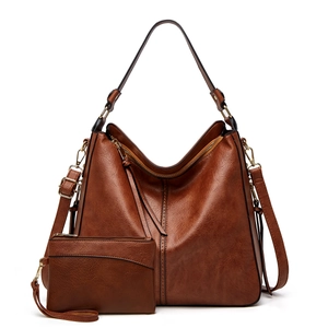 Brown PU leather tote bag with matching coin purse shown on a clean white background