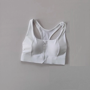 Detail of white high-impact sports bra with front zipper and breathable mesh racerback
