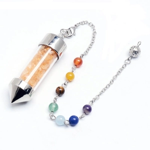 Close-up of healing crystal wish bottle necklace with chakra beads and orange stones