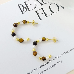 S925 silver C-shape stud earrings featuring tiger eye stones and white shell beads