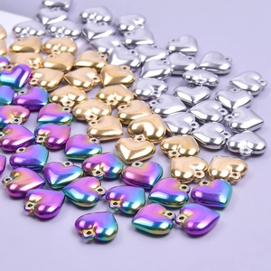 3D heart pendants in gold, silver and rainbow finishes made of polished stainless steel