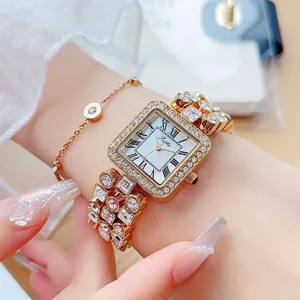Luxurious gold square watch for women with crystal inlay and Roman numerals