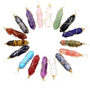 Set of 16 hexagonal crystal point pendants wrapped in gold wire with various natural stones