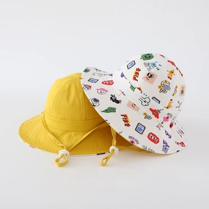 Detail of cartoon print kids bucket hats with adjustable windproof chin straps