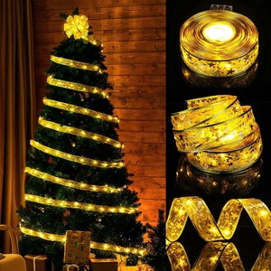 Golden Christmas ribbon LED fairy lights with snowflake patterns for tree decoration