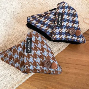Acrylic houndstooth triangle hair claw with retro button and plush ball detail