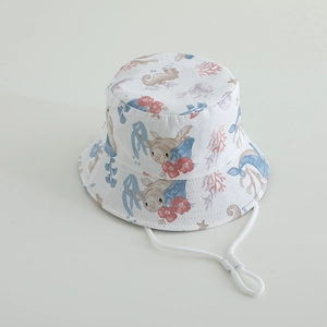 Detail of white kids sun hat with sea creature prints and adjustable chin strap