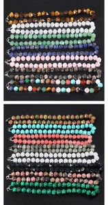 Detail of faceted natural stone necklaces with secure lobster clasps in multiple colors