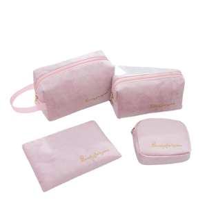4-piece pink velvet cosmetic bag set with golden Beautyforyou embroidery on white background