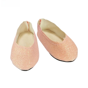Detailed top view of pink glitter doll ballet flats with fine stitching and black soles