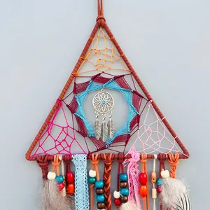 Handmade triangle dream catcher with colorful feathers and bohemian geometric weaving
