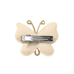 Handmade beige woven butterfly hair clip with gold wire antennae and silver metal croc grip