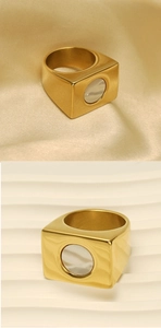 Detail of 18k gold plated square ring featuring a circular white mother of pearl inlay