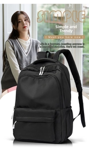 Detail of a large black commuting backpack featuring breathable padded shoulder straps