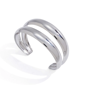 Close-up of polished silver stainless steel double-layered open cuff bracelet design