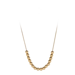 Elegant gold bead necklace with minimalist metallic round beads on a fine chain