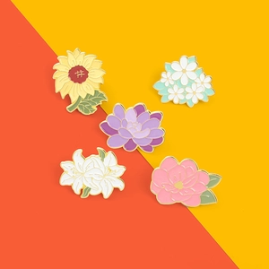 5-piece set of vibrant sunflower and lily enamel brooches with golden metal plating