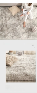 Detail of gray tie-dye long pile rug showing thick texture and soft plush surface