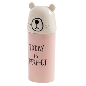 Portable pink travel toothbrush case with cute white bear lid and stylish text