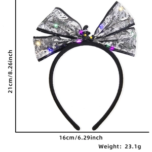 Detail of Halloween LED headband with dimensions 21x16cm and silver spider web bow