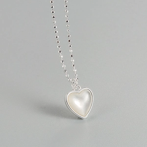 Elegant 925 sterling silver ball chain necklace with a white mother-of-pearl heart pendant