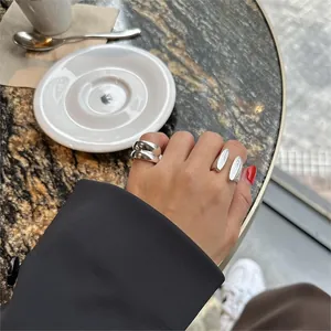 Minimalist S925 silver rings with unique olive texture and double-layered open design