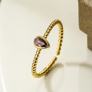 Adjustable 18K gold plated ring with pear-cut purple gemstone and beaded band