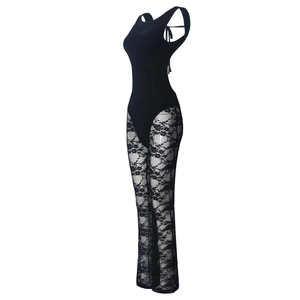 Detailed view of floral lace texture and sheer mesh on this sleeveless black jumpsuit