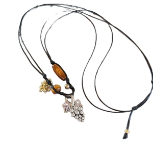 Bohemian grape pendant necklace with wooden beads and sparkling crystals on black cord