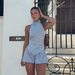 Light blue halter neck backless top and wide-leg shorts set in brushed faux suede finish