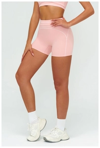 Detail view of pink high-waisted shorts with white contrast stitching and matte finish