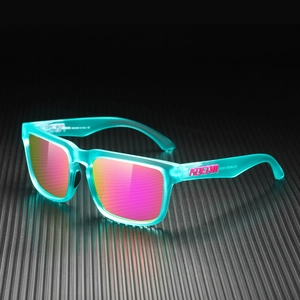 Detail of square polarized sunglasses with translucent frame and Italy design markings
