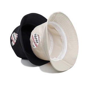 Classic cotton bucket hats in black and beige with embroidered red heart motif