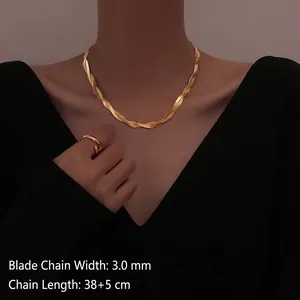 Three-strand 18K gold plated snake chain necklace set with matching ring on female model