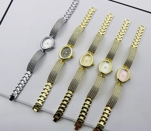 Collection of oval rhinestone quartz watches for women with gold and silver metal straps