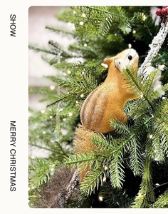 Detail of realistic golden squirrel Christmas tree ornament with soft fuzzy texture